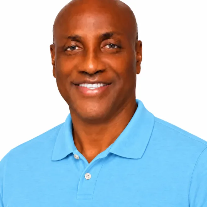 Randy Sonson, founder of Handro Learning, smiling in a light blue polo shirt
